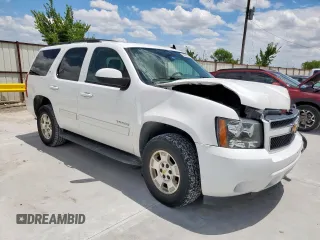 2014 Chevrolet Tahoe LT with VIN 1GNSCBE07ER239575, listed as a Copart auction lot 63094525 with 142,467 mi miles and Salvage title. Bid and sale history available at DreamBid. Image 4.