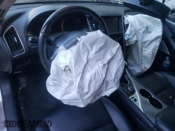 2017 Infiniti Q50 Premium with VIN JN1EV7AR2HM830404, listed as a Copart auction lot 57874785 with 104,369 mi miles and Salvage title. Bid and sale history available at DreamBid. Image 8.