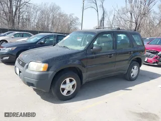 2003 Ford Escape XLS Popular with VIN 1FMYU02153KB46301, listed as a IAAI auction lot 41793418 with 188,184 mi miles. Bid and sale history available at carsss.com. Image 2.