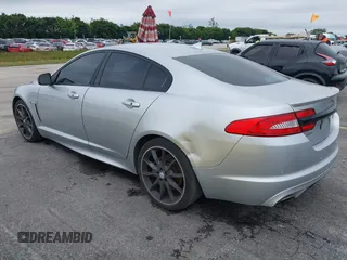 2015 Jaguar XF V6 Portfolio with VIN SAJWA0F79F8U77985, listed as a IAAI auction lot 41386030 with 81,335 mi miles. Bid and sale history available at carsss.com. Image 3.
