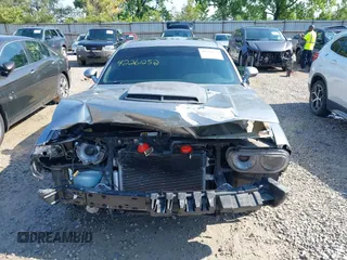2014 Dodge Challenger R/T z VIN 2C3CDYBT9EH139932, wystawiony jako IAAI lot #42261252 z przebiegiem 95 241 mil mil oraz . Historia ofert i sprzedaży dostępna na DreamBid. Obrazek 13.