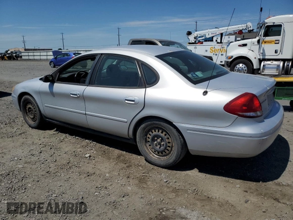 2005 Ford Taurus SE with VIN 1FAFP53U25A303516, listed as a Copart auction lot 63250505 with 203,463 mi miles and Salvage title. Bid and sale history available at DreamBid. Image 2.