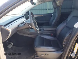 2023 Tesla Model Y Long Range with VIN 7SAYGDEE5PF892285, listed as a Copart auction lot 46458635 with 39,951 mi miles and Salvage Title. Bid and sale history available at DreamBid. Image 7.