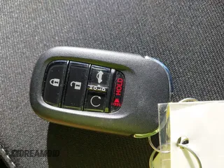 2022 Honda Civic Sport z VIN 2HGFE2F50NH601567, wystawiony jako IAAI lot #40880687 z przebiegiem 16 587 mil mil oraz . Historia ofert i sprzedaży dostępna na DreamBid. Obrazek 11.