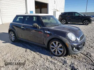 2013 MINI Hardtop S with VIN WMWSV3C52DT393181, listed as a Copart auction lot 50179065 with 66,655 mi miles and Salvage Title. Bid and sale history available at DreamBid. Image 4.