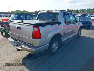 2004 Ford Explorer Sport Trac XLS z VIN 1FMDU77K74UB69268, wystawiony jako IAAI lot #42055157 z przebiegiem 127 573 mil mil oraz . Historia ofert i sprzedaży dostępna na DreamBid. Obrazek 4.