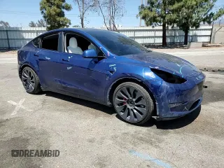 2021 Tesla Model Y Performance z VIN 5YJYGDEF0MF157795, wystawiony jako Copart lot #57163245 z przebiegiem 62 598 mil mil oraz Szkoda całkowita • Salvage title. Historia ofert i sprzedaży dostępna na DreamBid. Obrazek 14.