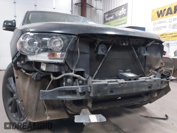 2013 Dodge Durango R/T z VIN 1C4SDJCT4DC670406, wystawiony jako IAAI lot #41685272 z przebiegiem 230 767 mil mil oraz . Historia ofert i sprzedaży dostępna na DreamBid. Obrazek 6.