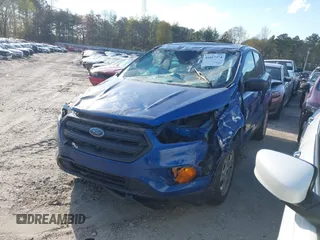 2017 Ford Escape S with VIN 1FMCU0F70HUE01165, listed as a IAAI auction lot 41857374 with 56,973 mi miles. Bid and sale history available at carsss.com. Image 2.