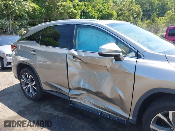 2017 Lexus RX 350 with VIN 2T2BZMCA5HC111845, listed as a IAAI auction lot 42551053 with 64,041 mi miles and . Bid and sale history available at DreamBid. Image 6.