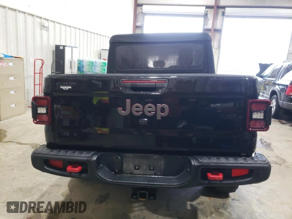 2020 Jeep Gladiator Rubicon with VIN 1C6JJTBG9LL183888, listed as a Copart auction lot 70225794 with 57,969 mi miles and Salvage title. Bid and sale history available at DreamBid. Image 6.