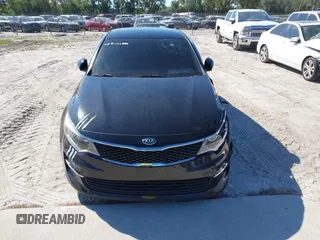 2018 Kia Optima LX with VIN 5XXGT4L3XJG203237, listed as a IAAI auction lot 40631696 with 157,012 mi miles and . Bid and sale history available at DreamBid. Image 13.