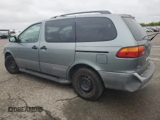 2000 Toyota Sienna LE with VIN 4T3ZF13C2YU217185, listed as a Copart auction lot 82407944 with 244,381 mi miles and Salvage Title. Bid and sale history available at carsss.com. Image 2.