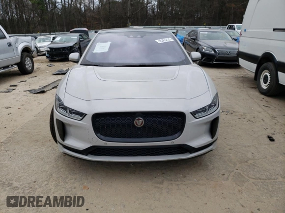 2020 Jaguar I-Pace HSE z VIN SADHD2S19L1F85465, wystawiony jako Copart lot #38365423 z przebiegiem Nie podano mil oraz . Historia ofert i sprzedaży dostępna na DreamBid. Obrazek 5.