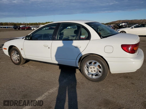 2001 Saturn SL z VIN 1G8ZK52771Z219294, wystawiony jako Copart lot #83155494 z przebiegiem 190 338 mil mil oraz Szkody całkowita. Historia ofert i sprzedaży dostępna na DreamBid. Obrazek 2.