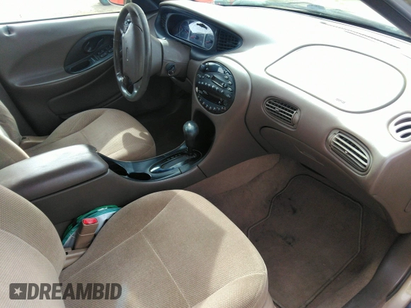 1999 Ford Taurus SE with VIN 1FAFP53S9XA330603, listed as a IAAI auction lot 41819819 with 207,025 mi miles. Bid and sale history available at carsss.com. Image 5.