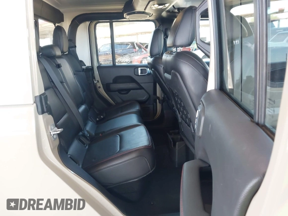2022 Jeep Gladiator Rubicon with VIN 1C6JJTBG2NL164117, listed as a IAAI auction lot 42450350 with 22,326 mi miles and . Bid and sale history available at DreamBid. Image 8.