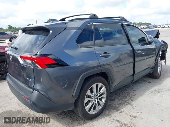 2021 Toyota RAV4 XLE Premium with VIN 2T3C1RFVXMC111658, listed as a IAAI auction lot 42594838 with 58,734 mi miles and . Bid and sale history available at DreamBid. Image 4.