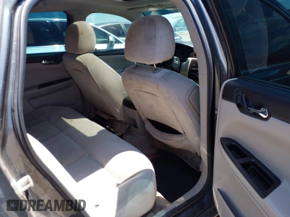 2014 Chevrolet Impala LT with VIN 2G1WB5E31E1106255, listed as a IAAI auction lot 41960424 with 235,070 mi miles and . Bid and sale history available at DreamBid. Image 8.