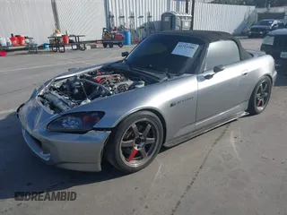 2004 Honda S2000 with VIN JHMAP21424T004079, listed as a IAAI auction lot 41711408 with 111,665 mi miles and . Bid and sale history available at DreamBid. Image 2.