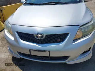 2010 Toyota Corolla z VIN 2T1BU4EE3AC500511, wystawiony jako IAAI lot #42731216 z przebiegiem 143 255 mil mil oraz . Historia ofert i sprzedaży dostępna na DreamBid. Obrazek 6.