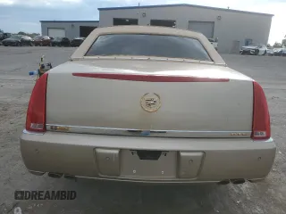 2006 Cadillac DTS 1SC z VIN 1G6KD57Y06U187282, wystawiony jako Copart lot #72627494 z przebiegiem 142 191 mil mil oraz Szkoda całkowita • Salvage title. Historia ofert i sprzedaży dostępna na DreamBid. Obrazek 6.