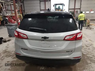 2018 Chevrolet Equinox LT z VIN 2GNAXSEV6J6198809, wystawiony jako IAAI lot #41945758 z przebiegiem 196 485 mil mil oraz . Historia ofert i sprzedaży dostępna na DreamBid. Obrazek 17.