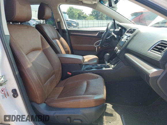 2019 Subaru Outback Touring with VIN 4S4BSATC7K3221137, listed as a Copart auction lot 66643915 with 173,317 mi miles and Salvage title. Bid and sale history available at DreamBid. Image 7.