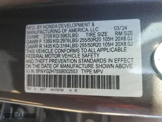 2025 Honda Pilot Touring with VIN 5FNYG2H75SB002553, listed as a Copart auction lot 76869764 with 7,426 mi miles and Salvage Title. Bid and sale history available at carsss.com. Image 14.