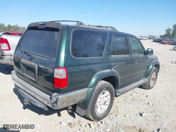 2000 Toyota 4Runner SR5 with VIN JT3HN86R6Y0305155, listed as a IAAI auction lot 41890566 with 223,502 mi miles. Bid and sale history available at carsss.com. Image 4.