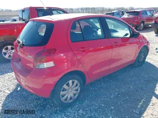 2010 Toyota Yaris with VIN JTDKT4K36A5295530, listed as a IAAI auction lot 41896456 with 337,570 mi miles. Bid and sale history available at carsss.com. Image 4.