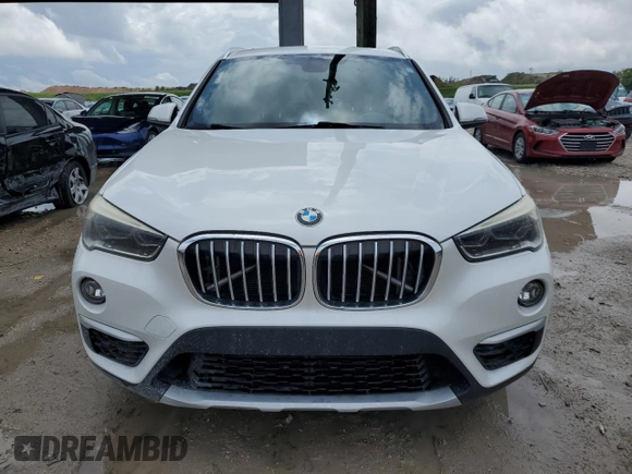 2016 BMW X1 xDrive28i with VIN WBXHT3C34GP887401, listed as a Copart auction lot 52255655 with 129,599 mi miles and Clean Title. Bid and sale history available at carsss.com. Image 5.
