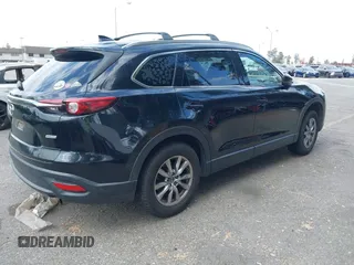 2018 Mazda CX-9 Touring with VIN JM3TCACY9J0234304, listed as a IAAI auction lot 41407496 with 122,824 mi miles. Bid and sale history available at carsss.com. Image 4.