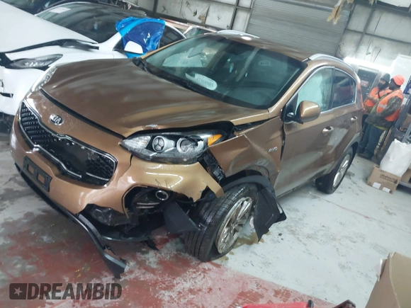 2018 Kia Sportage LX with VIN KNDPMCACXJ7446520, listed as a IAAI auction lot 41568985 with 79,601 mi miles and . Bid and sale history available at DreamBid. Image 16.