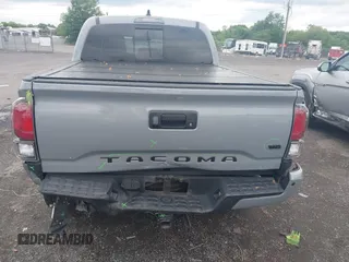 2021 Toyota Tacoma SR with VIN 5TFCZ5AN3MX258746, listed as a IAAI auction lot 42252967 with 62,095 mi miles and . Bid and sale history available at DreamBid. Image 6.