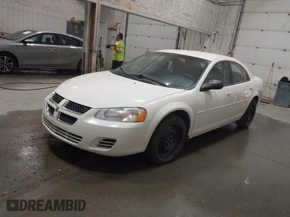 2006 Dodge Stratus SXT z VIN 1B3EL46XX6N153412, wystawiony jako IAAI lot #42096526 z przebiegiem 57 014 mil mil oraz . Historia ofert i sprzedaży dostępna na DreamBid. Obrazek 2.