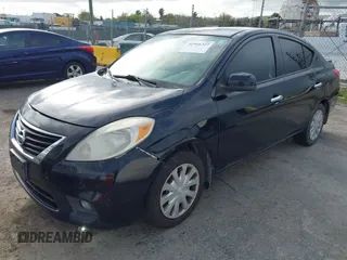 2014 Nissan Versa SV with VIN 3N1CN7APXEL831487, listed as a IAAI auction lot 41916327 with 130,304 mi miles. Bid and sale history available at carsss.com. Image 2.