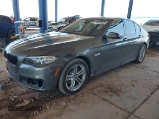 2014 BMW 5 Series 535d with VIN WBAXA5C54ED001777, listed as a Copart auction lot 60890945 with 67,939 mi miles and Salvage title. Bid and sale history available at DreamBid. Image 1.