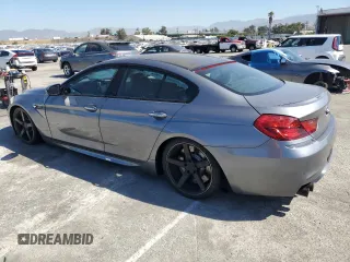 2015 BMW M6 z VIN WBS6C9C56FD467608, wystawiony jako Copart lot #67796074 z przebiegiem 67 706 mil mil oraz Szkoda całkowita • Salvage title. Historia ofert i sprzedaży dostępna na DreamBid. Obrazek 2.