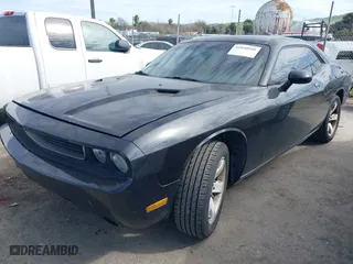 2011 Dodge Challenger with VIN 2B3CJ4DG9BH543159, listed as a IAAI auction lot 41850958 with 209,422 mi miles. Bid and sale history available at carsss.com. Image 17.