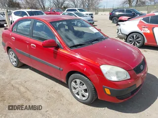 2009 Kia Rio SX with VIN KNADE223396484470, listed as a IAAI auction lot 41964027 with 167,380 mi miles. Bid and sale history available at carsss.com. Image 1.