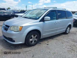 2011 Dodge Grand Caravan Crew with VIN 2D4RN5DG9BR660305, listed as a IAAI auction lot 42241401 with 176,079 mi miles and . Bid and sale history available at DreamBid. Image 2.