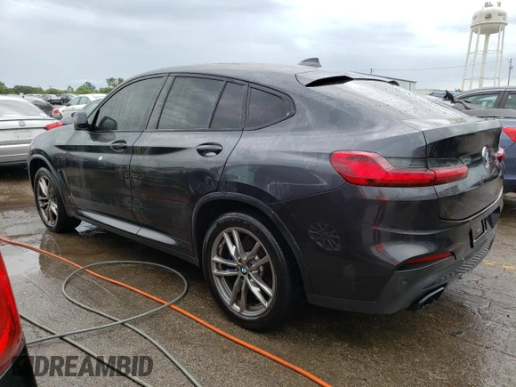 2021 BMW X4 M40i with VIN 5UX2V5C08M9E17162, listed as a Copart auction lot 67602073 with 33,879 mi miles. Bid and sale history available at carsss.com. Image 2.