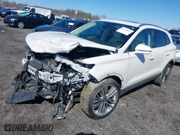 2015 Lincoln MKC with VIN 5LMTJ2AH8FUJ31911, listed as a IAAI auction lot 41735017 with 76,332 mi miles. Bid and sale history available at carsss.com. Image 2.