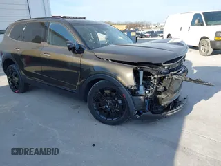 2022 Kia Telluride SX z VIN 5XYP5DHC2NG294489, wystawiony jako IAAI lot #41898817 z przebiegiem 12 521 mil mil oraz . Historia ofert i sprzedaży dostępna na DreamBid. Obrazek 1.