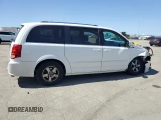 2011 Dodge Grand Caravan Crew with VIN 2D4RN5DG4BR699707, listed as a Copart auction lot 52055425 with 144,904 mi miles and Salvage Title. Bid and sale history available at DreamBid. Image 3.