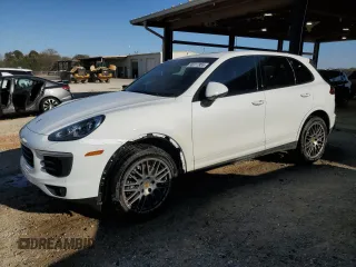 2018 Porsche Cayenne z VIN WP1AA2A2XJKA06647, wystawiony jako Copart lot #50317955 z przebiegiem 53 892 mil mil oraz Szkoda całkowita • Salvage title. Historia ofert i sprzedaży dostępna na DreamBid. Obrazek 1.