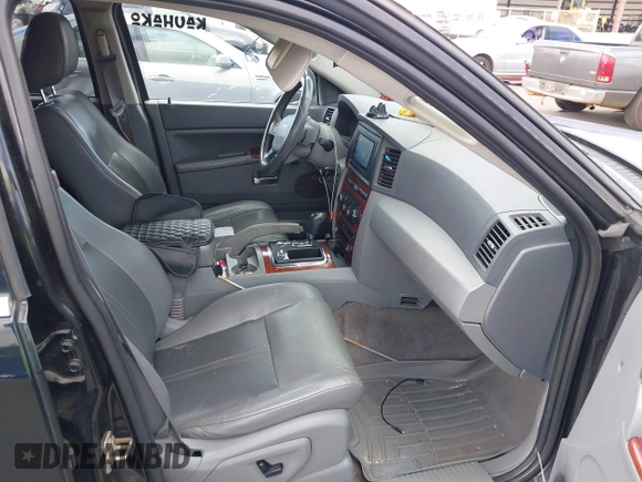 2007 Jeep Grand Cherokee Limited with VIN 1J8HR58N27C594744, listed as a IAAI auction lot 41929390 with 154,140 mi miles and . Bid and sale history available at DreamBid. Image 5.
