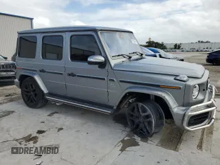 2023 Mercedes-Benz G 63 AMG with VIN W1NYC7HJ4PX489609, listed as a Copart auction lot 79165414 with 12,899 mi miles and Salvage Title. Bid and sale history available at DreamBid. Image 4.