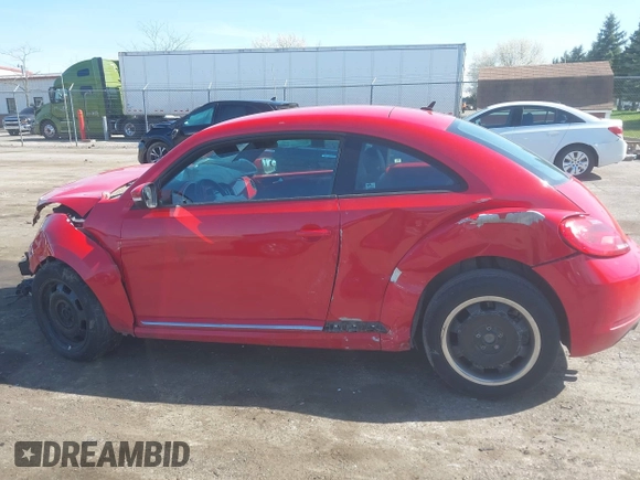 2012 Volkswagen Beetle 2.5L w/Sound/Nav PZEV with VIN 3VWJP7AT6CM620285, listed as a IAAI auction lot 42094101 with 125,737 mi miles and . Bid and sale history available at DreamBid. Image 14.